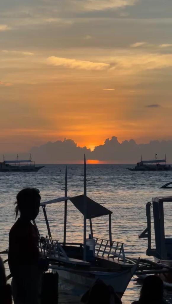 Maya Mobile eSIM UGC ad at sunset on the water